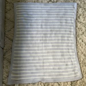 Gray and white striped pottery barn kids blanket
